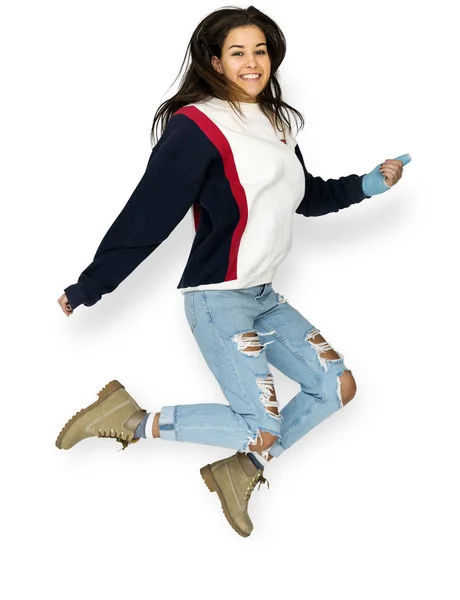 Jonge volwassen vrouw springen Studio portret — Stockfoto