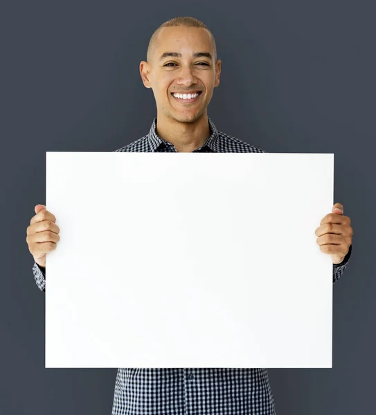 Man holding empty white placard — Stock Photo, Image