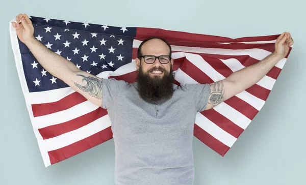 Man holding american flag — Stock Photo, Image
