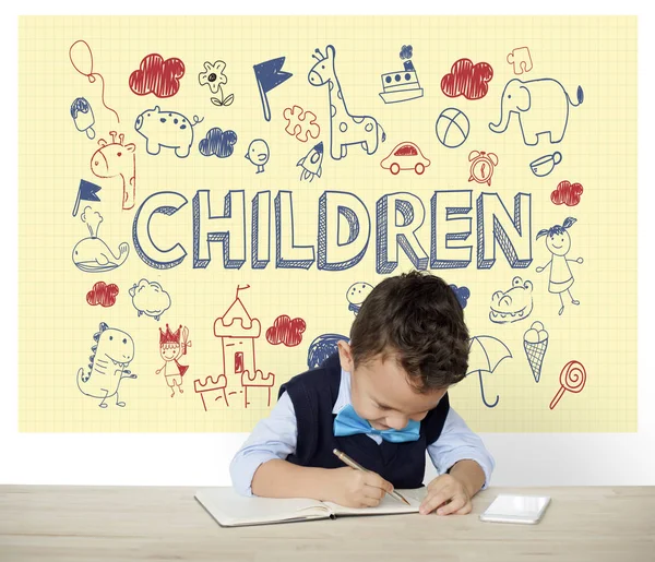Boy writing in notebook — Stock Photo, Image