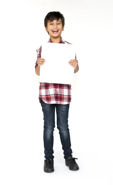 Boy holding paper blank placard — Stock Photo, Image