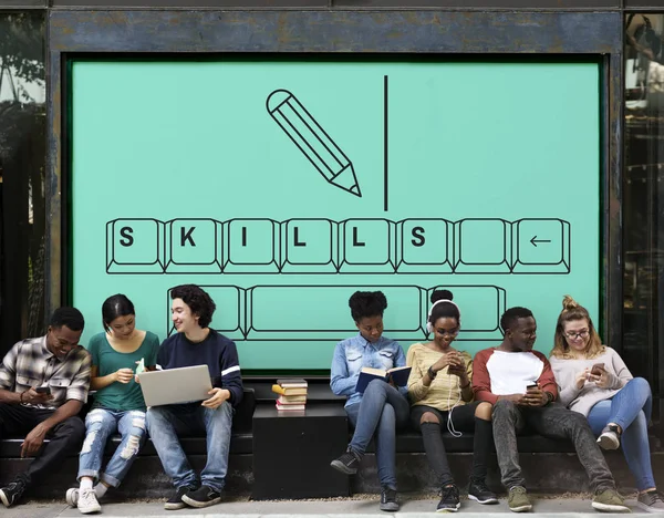 Young students siting near placard — Stock Photo, Image