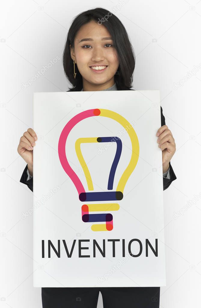 Woman Holding Banner with Bulb Sign
