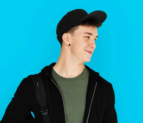 Smiling  teenager guy in the cap — Stock Photo, Image