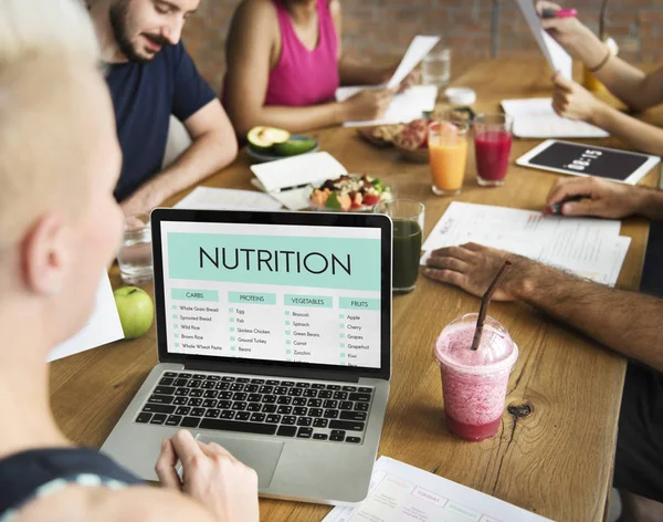 Grupp Mångfald Människor Mötet Öppnade Laptop Med Titel Nutrition Original — Stockfoto