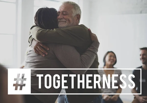 Man hugging woman at seminar — Stock Photo, Image