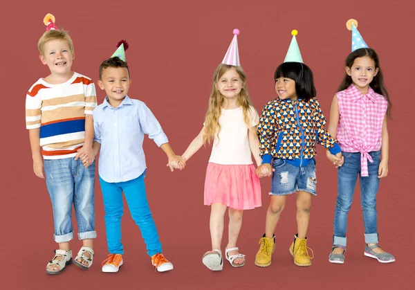 Niños en sombreros de fiesta —  Fotos de Stock