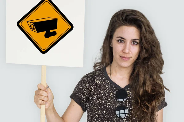 Beautiful woman holding placard — Stock Photo, Image