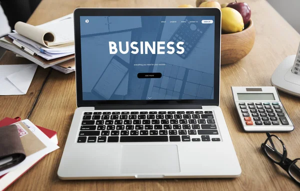 Objects and laptop on tabletop — Stock Photo, Image