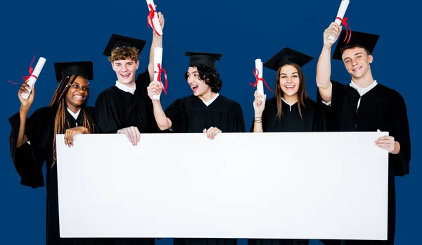 Students holding banner — Stock Photo, Image