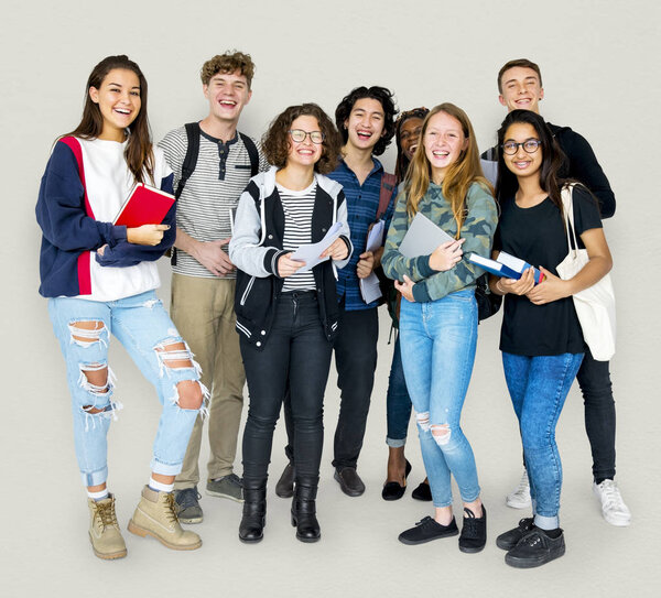 smiling  students standing in the studio 