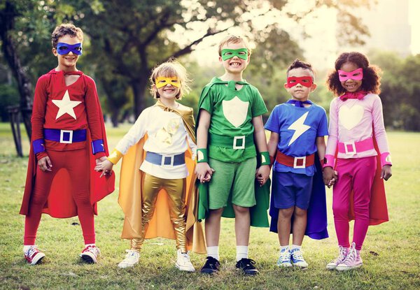 adorable children in Superhero costumes