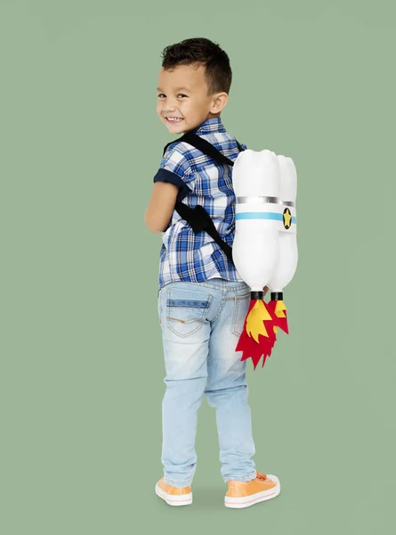 Menino com jetpack de brinquedo — Fotografia de Stock