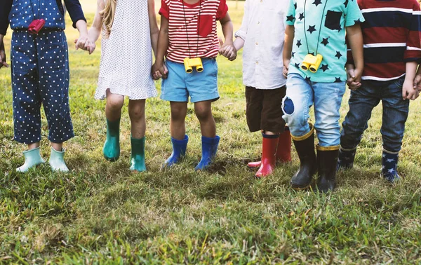 Children wearing rubber boots — Stock Photo, Image