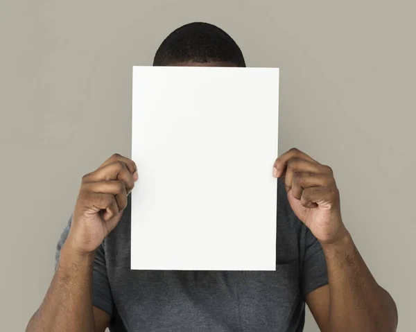 man holding blank placard
