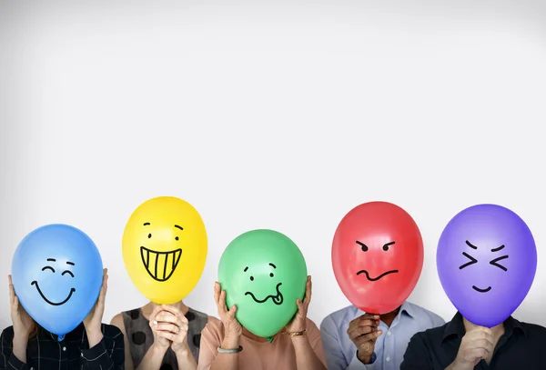 People standing with balloons — Stock Photo, Image