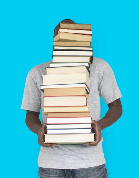 Man transporterar högen av läroböcker — Stockfoto
