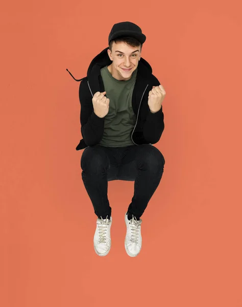 Boy jumping in the studio — Stock Photo, Image