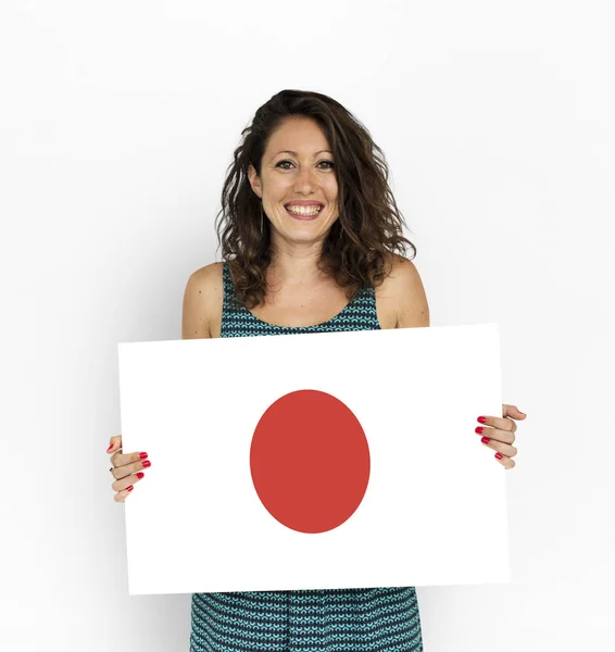 Junge Frau mit japanischer Fahne. — Stockfoto