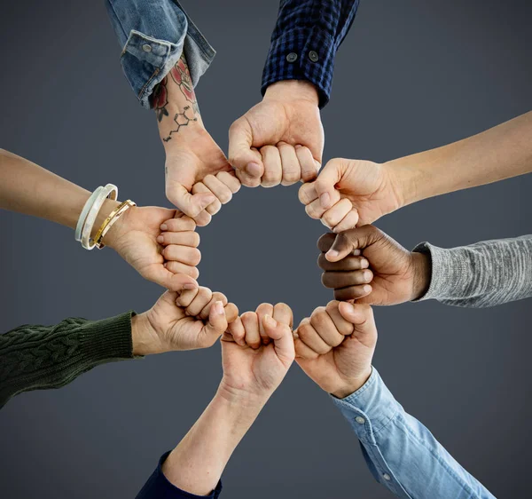 Hands fists together in circle — Stock Photo, Image
