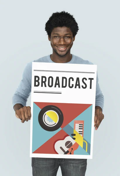 Hombre africano sosteniendo bandera gráfica — Foto de Stock