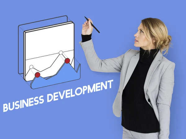 Businesswoman drawing on the wall — Stock Photo, Image