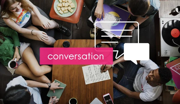 Group of friends at table — Stock Photo, Image