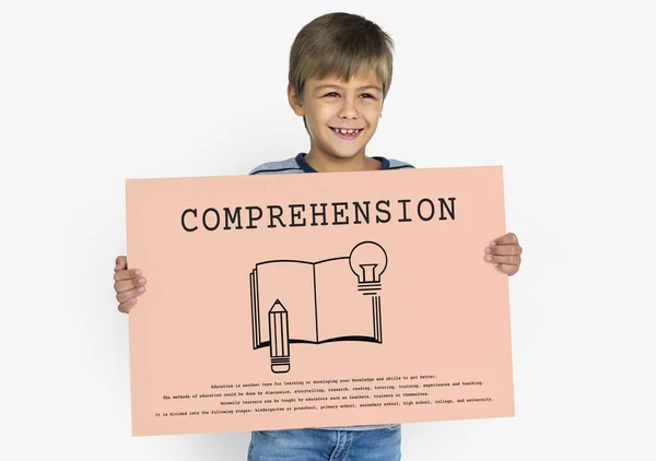 Boy holding banner — Stock Photo, Image