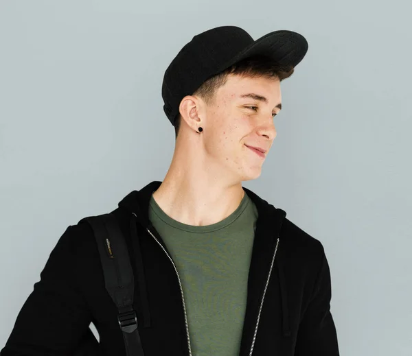 Smiling  teenager guy in the cap — Stock Photo, Image