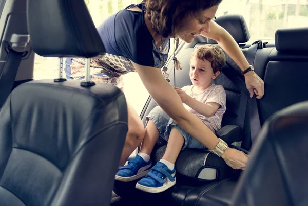 Responsible mother and son in car — Stock Photo, Image