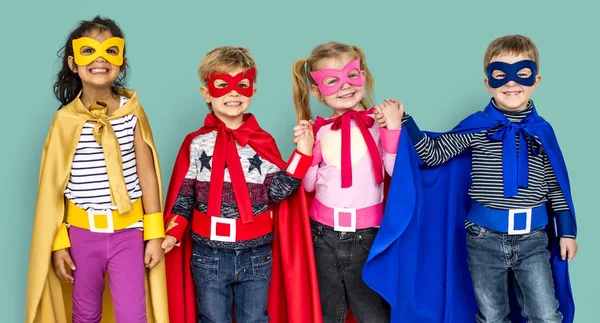 Kids in super heroe costumes — Stock Photo, Image