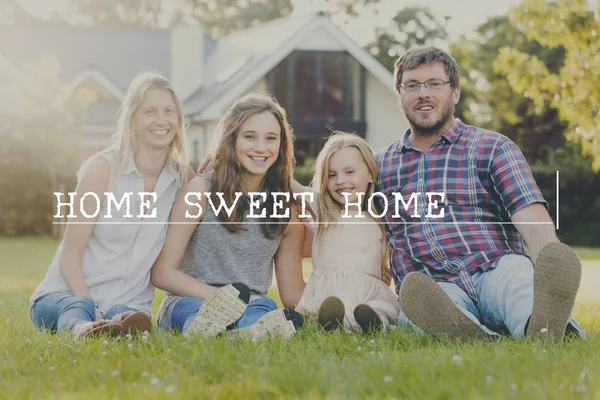 Family Relaxing on grass — Stock Photo, Image