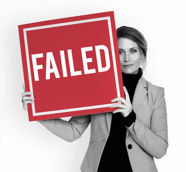 Businesswoman holding placard — Stock Photo, Image