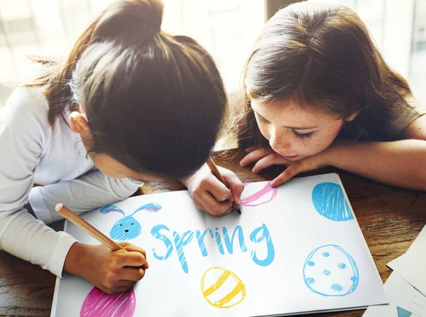 Little girls drawing easter graphics — Stock Photo, Image