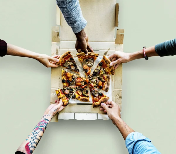 Hands taking slices of italian pizza — Stock Photo, Image