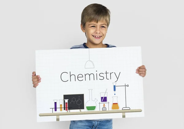 Boy holding banner — Stock Photo, Image