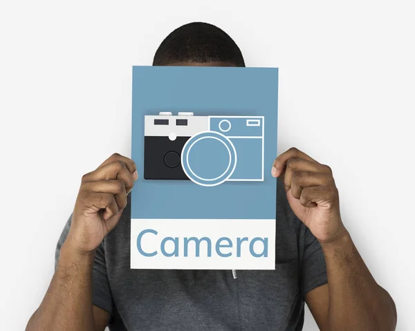 Man holding banner with camera — Stock Photo, Image