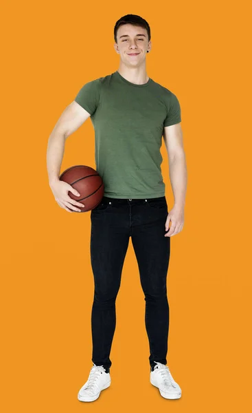 Man holding basketball — Stock Photo, Image