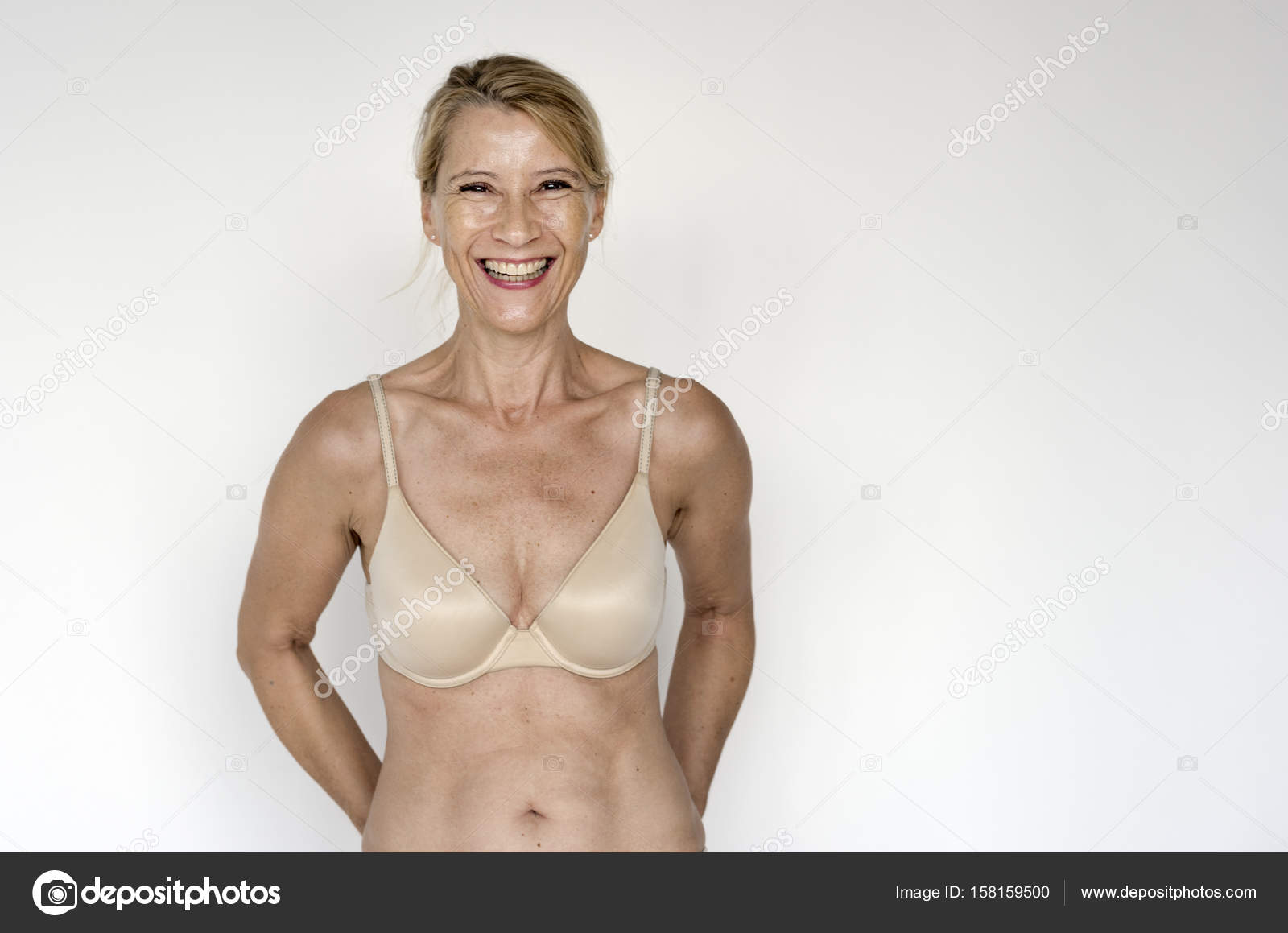 Smiling woman wearing bra Stock Photo by ©Rawpixel 158159500