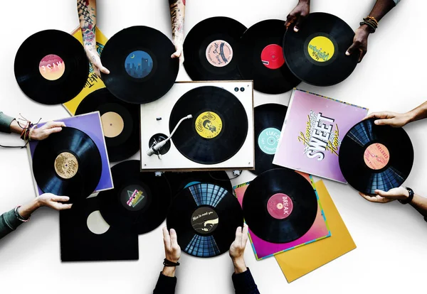 Manos y discos de vinilo — Foto de Stock