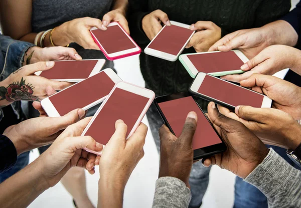 People holding mobile phones — Stock Photo, Image