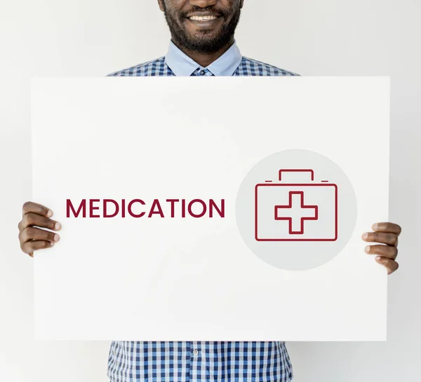 African man holding placard — Stock Photo, Image