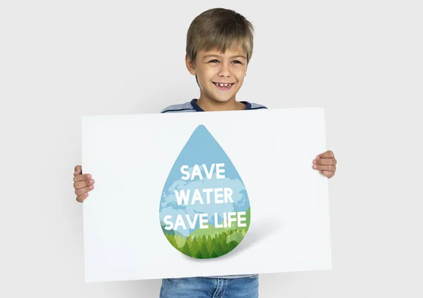 Boy holding banner — Stock Photo, Image