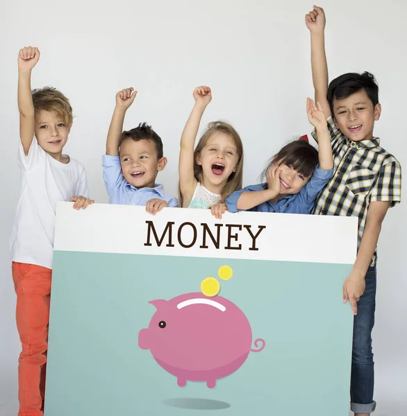 Little children holding placard — Stock Photo, Image