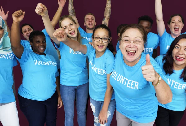 Volunteer people with rised up hands — Stock Photo, Image