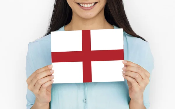 Jonge vrouw bedrijf Engelse vlag. — Stockfoto