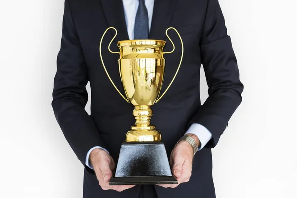 Verksamhet Man innehav golden trophy — Stockfoto