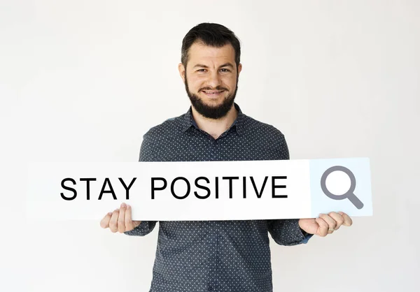 Bearded man holding placard — Stock Photo, Image