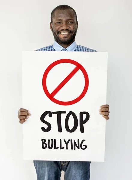 African man holding placard — Stock Photo, Image