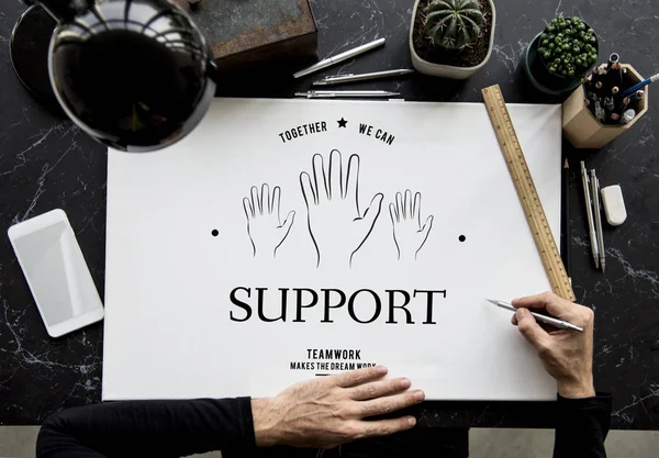 Hands working on the banner — Stock Photo, Image